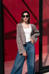 Crochet cardigan with white tank top and wide leg jeans